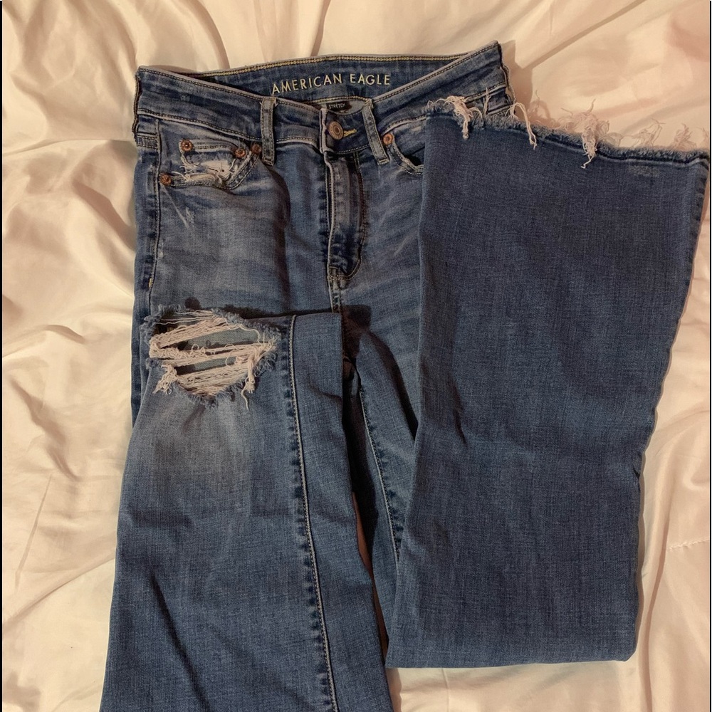 american eagle flared jeans with rip on one leg
